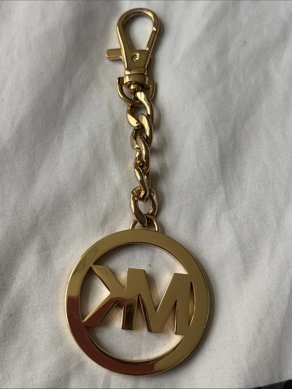 Michael Kors gold tone